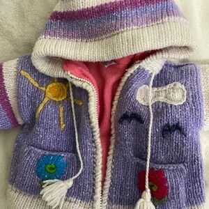 Hand made lamb wool sweater for little girl